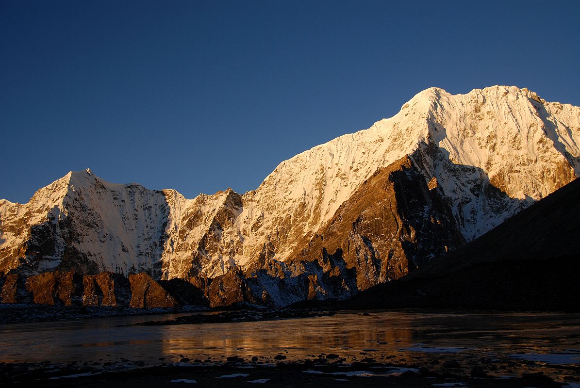 45 Pemthang Karpo Ri At Sunrise From Shishapangma Southwest Advanced Base Camp Pemthang Karpo Ri (6830m, also called Dome Blanc) shines at sunrise from Shishapangma Southwest Advanced Base Camp.